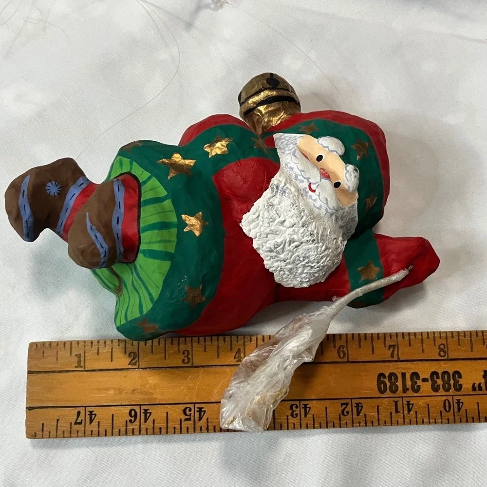 Paper mache Flying Santa with‎ gold stars